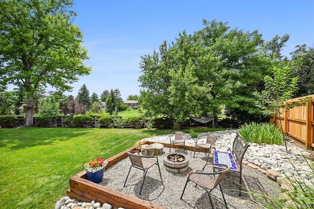 8413 E Jamison Cir, Englewood, CO 80112 - view of yard with a fire pit