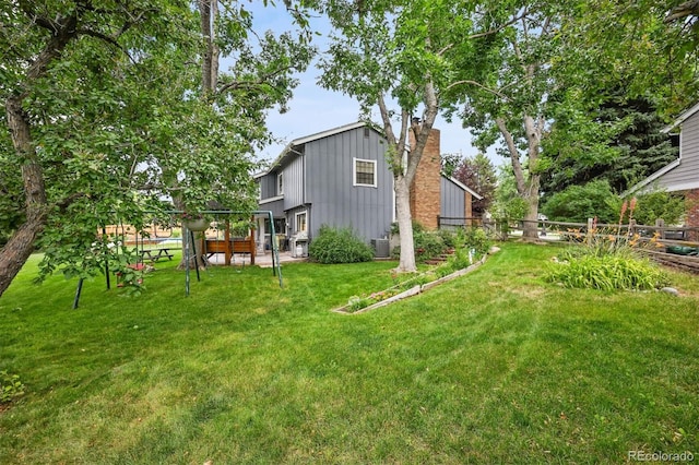 8413 E Jamison Cir, Englewood, CO 80112 - view of yard featuring a wooden deck