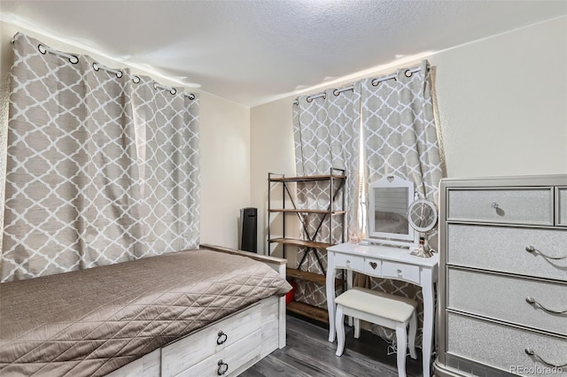 bedroom featuring dark wood-type flooring