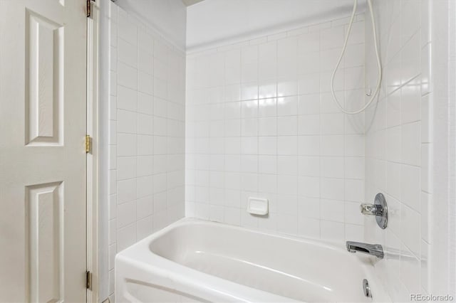 bathroom with shower / washtub combination