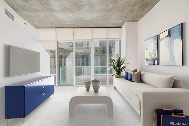 carpeted living room featuring floor to ceiling windows