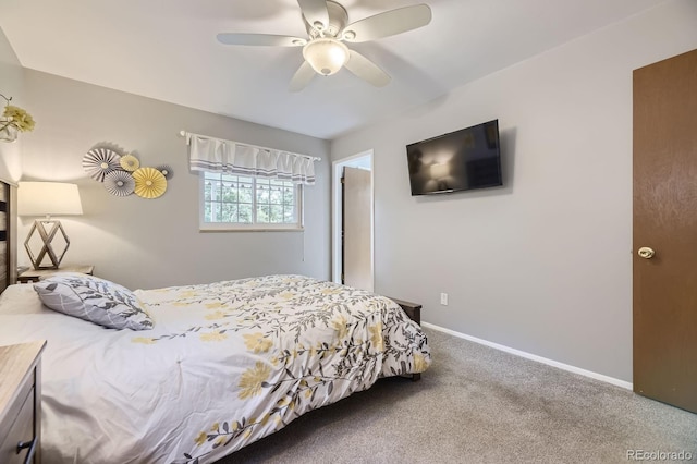 bedroom featuring carpet floors, baseboards, and a ceiling fan