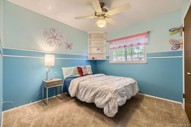 bedroom with baseboards, ceiling fan, and carpet floors