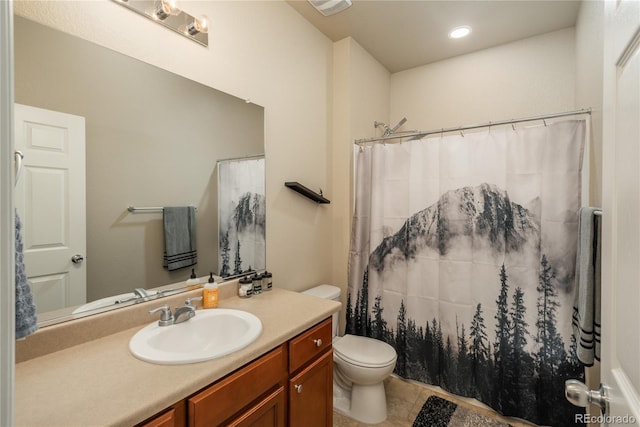 6434 N Ensenada Ct, Aurora, CO 80019 - bathroom with vanity, tile patterned flooring, curtained shower, toilet, and recessed lighting