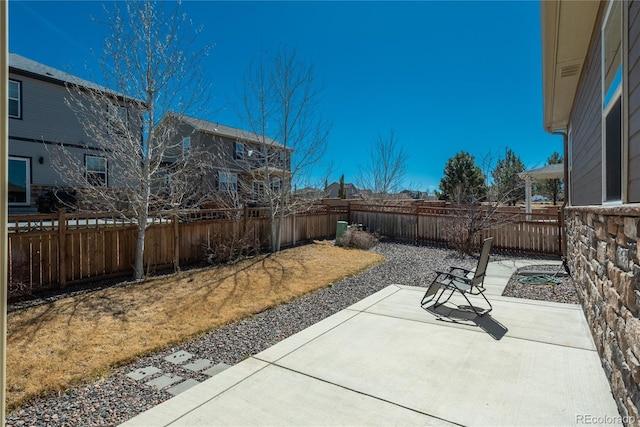 6434 N Ensenada Ct, Aurora, CO 80019 - view of patio featuring a fenced backyard