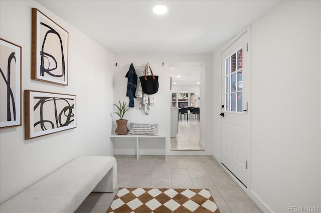 mudroom featuring light tile patterned flooring