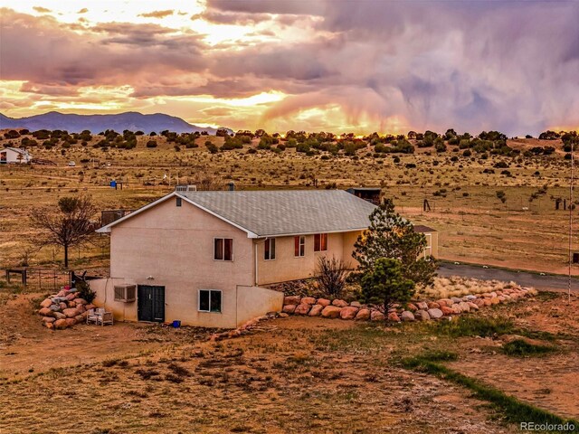 3569 County Road 19, Florence, CO 81226 - view of property exterior featuring a mountain view and a rural view