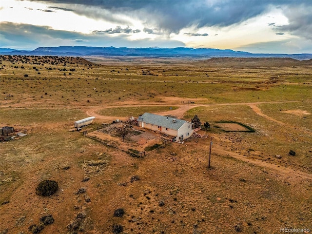 3569 County Road 19, Florence, CO 81226 - overview of rural landscape with a mountain backdrop