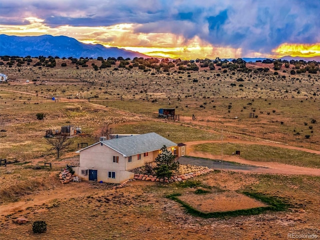 3569 County Road 19, Florence, CO 81226 - overview of rural landscape featuring mountains