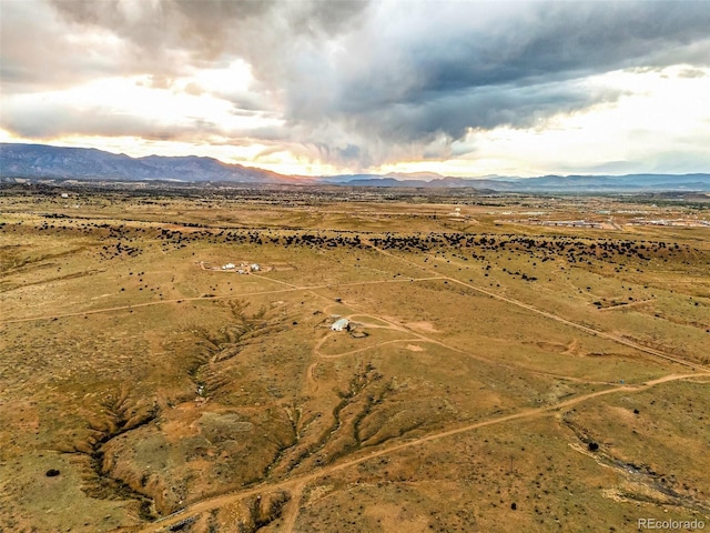3569 County Road 19, Florence, CO 81226 - aerial view of property's location featuring mountains and rural landscape