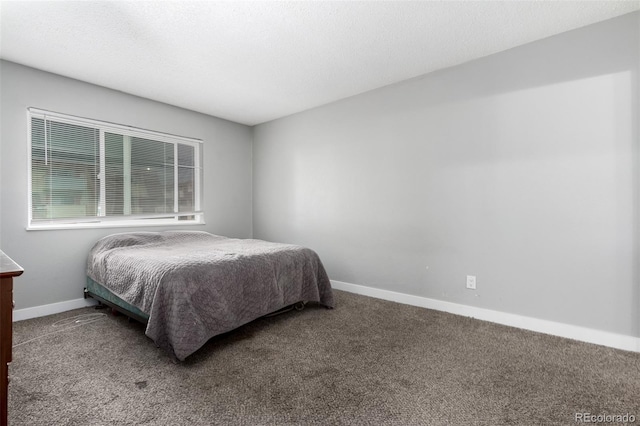 10211 Ura Ln Unit 8-102, Thornton, CO 80260 - carpeted bedroom with baseboards