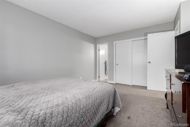 10211 Ura Ln Unit 8-102, Thornton, CO 80260 - carpeted bedroom with a closet