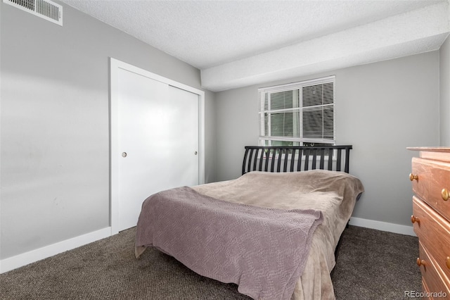 10211 Ura Ln Unit 8-102, Thornton, CO 80260 - bedroom featuring carpet and a closet