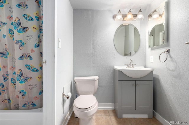 10211 Ura Ln Unit 8-102, Thornton, CO 80260 - full bathroom featuring vanity, tile patterned floors, and shower / bath combo with shower curtain