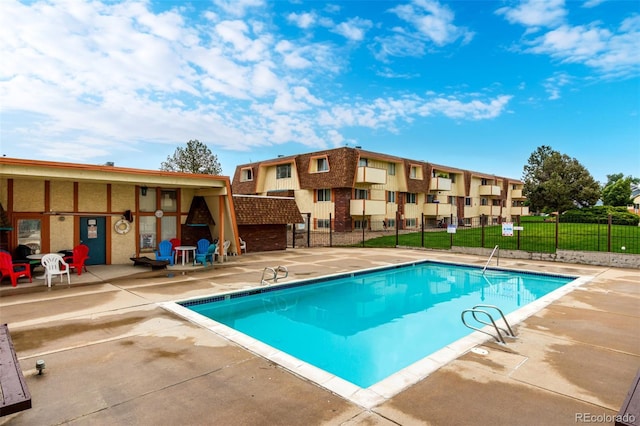 10211 Ura Ln Unit 8-102, Thornton, CO 80260 - community pool featuring a patio