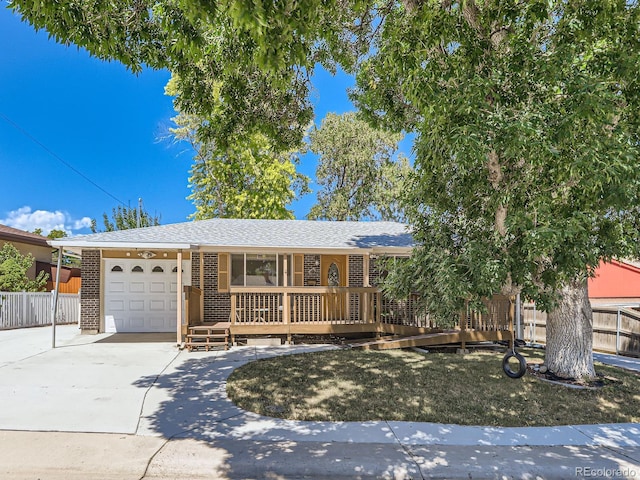 view of front of property featuring a garage