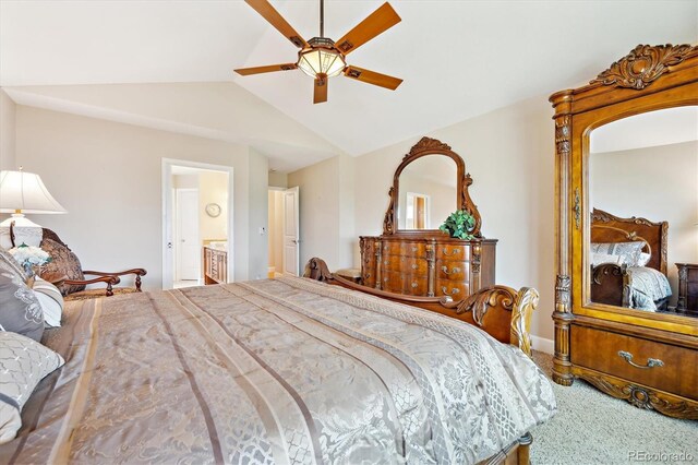 carpeted bedroom featuring ensuite bathroom, ceiling fan, and lofted ceiling