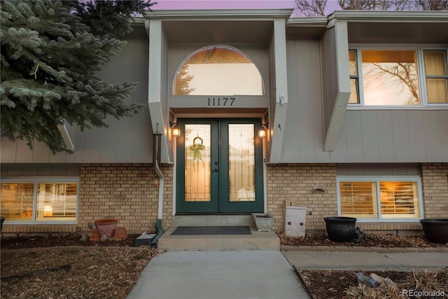 view of exterior entry with french doors