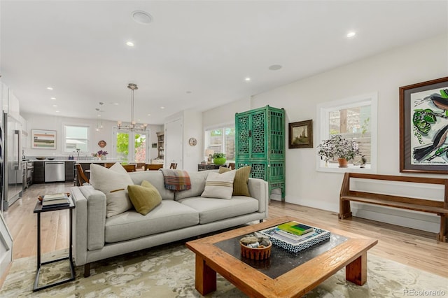3168 W 29th Ave, Denver, CO 80211 - living room featuring light wood finished floors, recessed lighting, and baseboards
