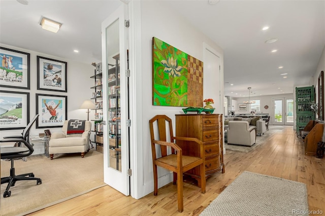 3168 W 29th Ave, Denver, CO 80211 - hallway featuring french doors, light wood-type flooring, and recessed lighting