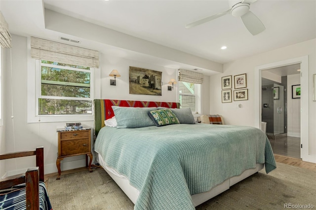 3168 W 29th Ave, Denver, CO 80211 - bedroom with light wood finished floors, baseboards, multiple windows, recessed lighting, and ceiling fan
