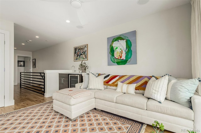 3168 W 29th Ave, Denver, CO 80211 - living room featuring wood finished floors, bar with sink, recessed lighting, and beverage cooler