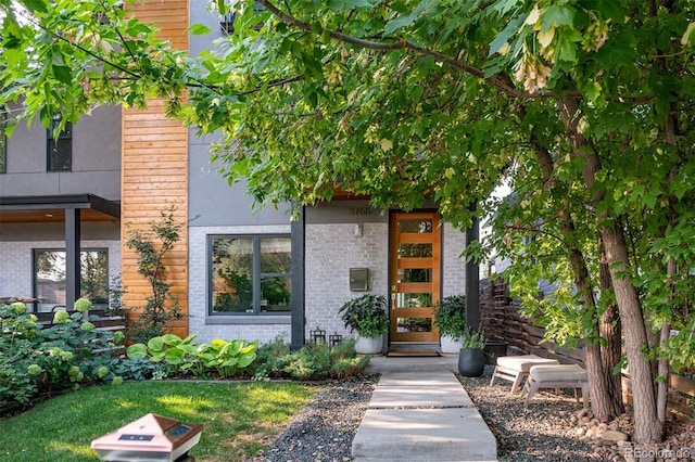 3168 W 29th Ave, Denver, CO 80211 - doorway to property featuring brick siding
