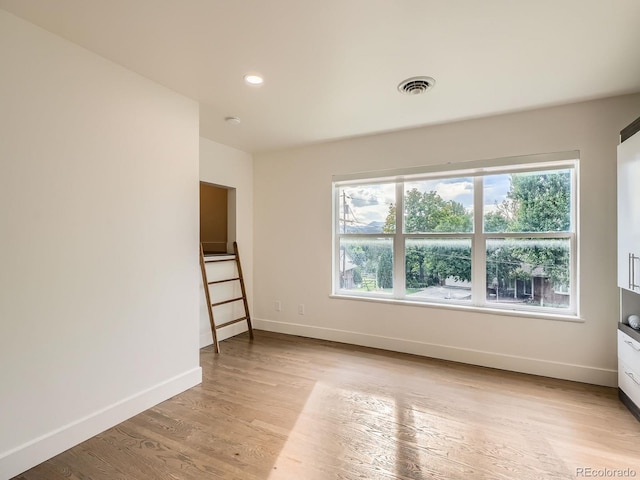 22 Rangeview Dr, Wheat Ridge, CO 80215 - empty room featuring light wood-style floors and recessed lighting