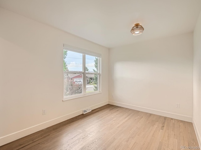 22 Rangeview Dr, Wheat Ridge, CO 80215 - spare room with baseboards and light wood-type flooring