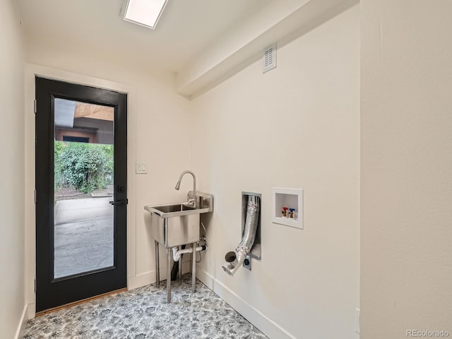 22 Rangeview Dr, Wheat Ridge, CO 80215 - laundry room with washer hookup and baseboards