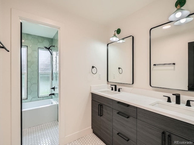 22 Rangeview Dr, Wheat Ridge, CO 80215 - full bath with double vanity, shower / tub combination, and tile patterned flooring
