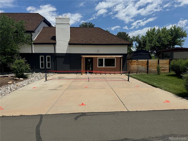 22 Rangeview Dr, Wheat Ridge, CO 80215 - rear view of property with a chimney