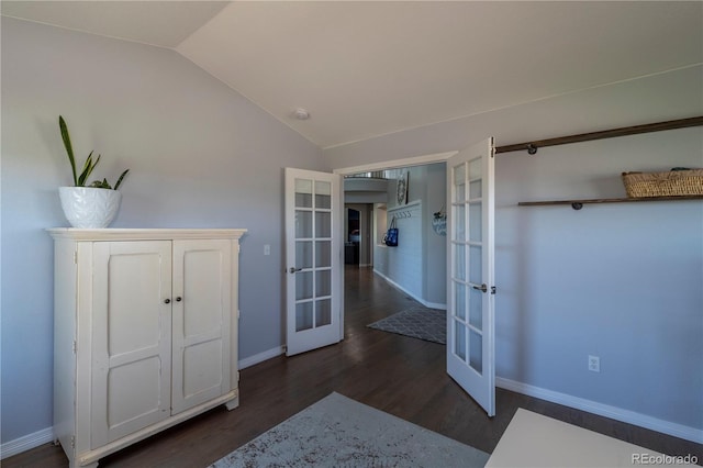 2339 Elkhorn St, Parker, CO 80138 - unfurnished bedroom with french doors, lofted ceiling, dark wood finished floors, and baseboards