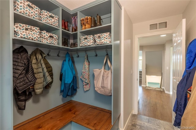 2339 Elkhorn St, Parker, CO 80138 - mudroom featuring baseboards and wood finished floors