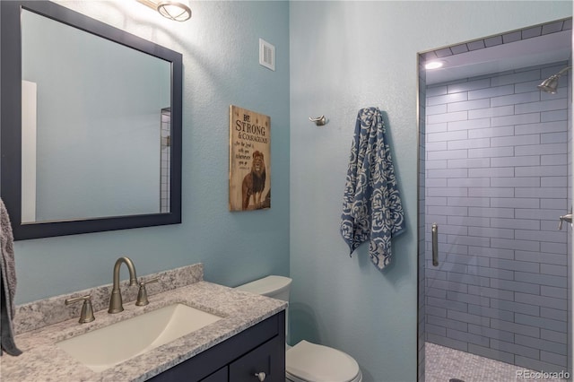 2339 Elkhorn St, Parker, CO 80138 - bathroom with a stall shower, toilet, and vanity