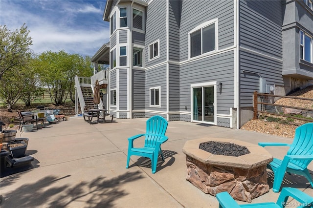 2339 Elkhorn St, Parker, CO 80138 - view of patio featuring an outdoor fire pit and stairs