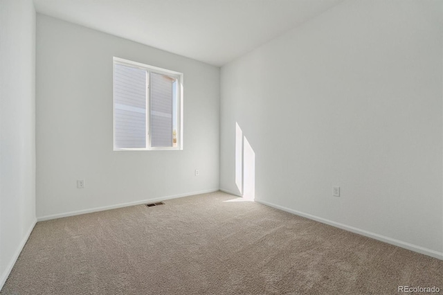 view of carpeted spare room