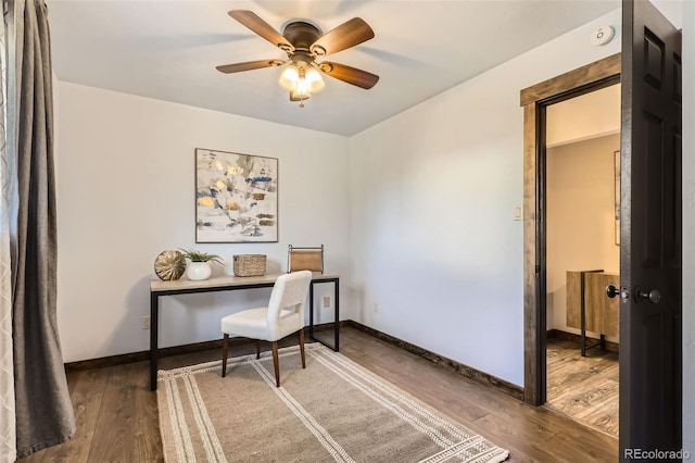 office area with ceiling fan and wood-type flooring