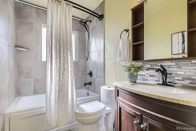 full bathroom featuring tasteful backsplash, shower / bath combo with shower curtain, vanity, and toilet