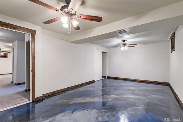 spare room with ceiling fan