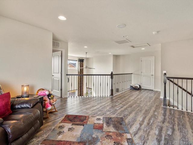 353 Zuniga St, Brighton, CO 80601 - interior space with recessed lighting, baseboards, visible vents, and wood finished floors
