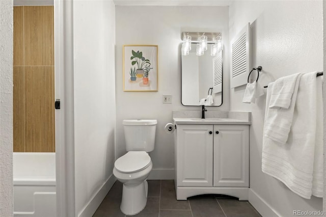 bathroom with tile patterned floors, toilet, vanity, and baseboards