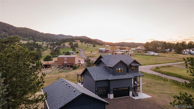 aerial view at dusk with a mountain view