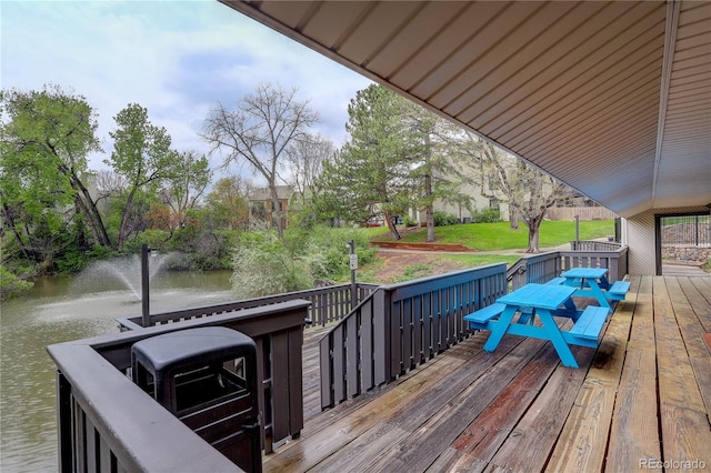 3550 S Harlan St Unit 259, Denver, CO 80235 - wooden terrace featuring a water view