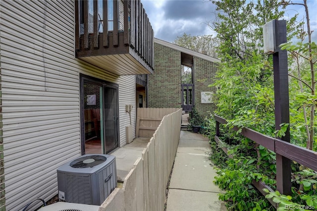 3550 S Harlan St Unit 259, Denver, CO 80235 - view of patio with a balcony and central air condition unit