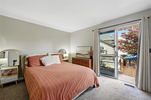 1172 S Zeno Way Unit F, Aurora, CO 80017 - carpeted bedroom featuring access to exterior