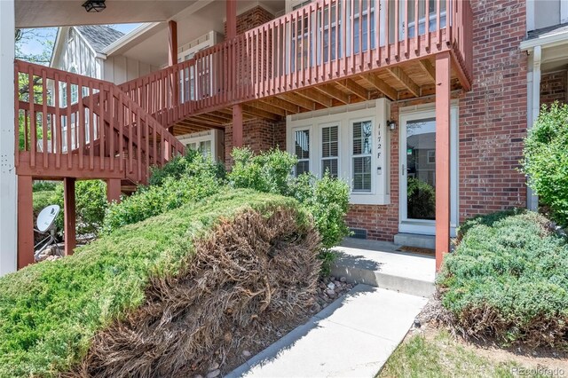 1172 S Zeno Way Unit F, Aurora, CO 80017 - property entrance featuring brick siding