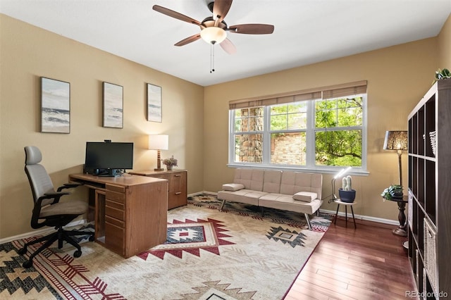 6542 S Tempe St, Aurora, CO 80016 - office space with hardwood / wood-style floors and a ceiling fan
