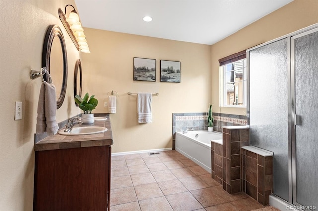 6542 S Tempe St, Aurora, CO 80016 - bathroom featuring double vanity, a bath, tile patterned flooring, and a shower stall