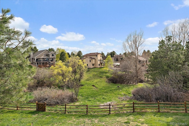 8072 Windwood Way, Parker, CO 80134 - view of community featuring a lawn and fence